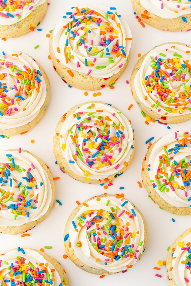 Cake mix cookies with vanilla buttercream and sprinkles.