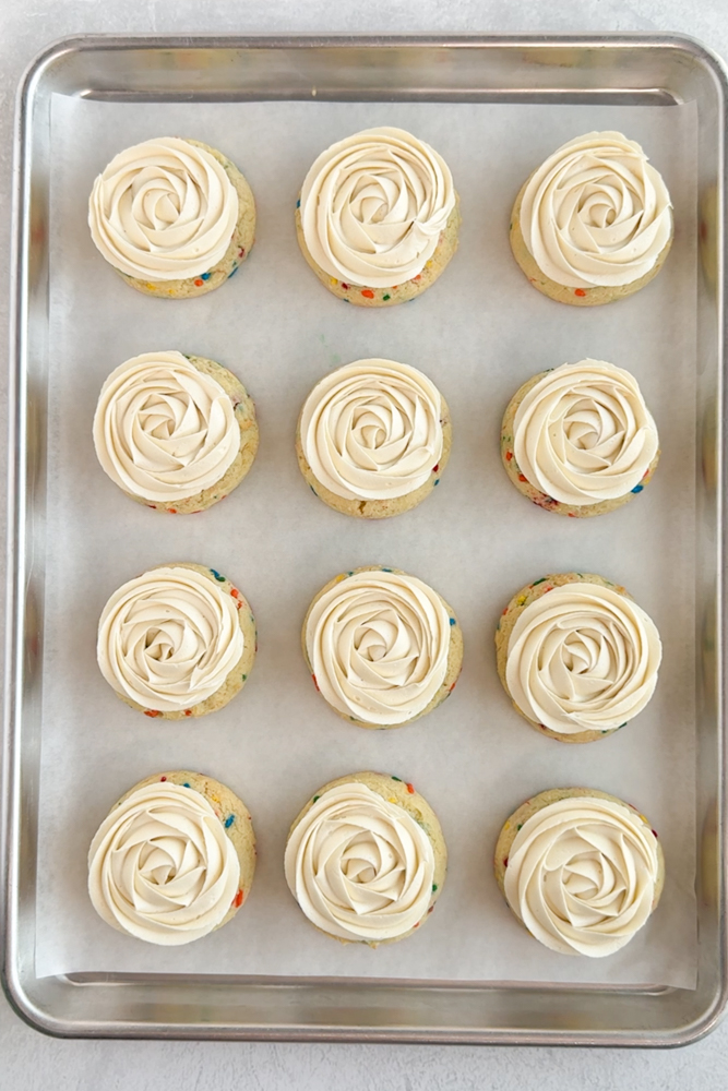 Cookies with vanilla frosting.