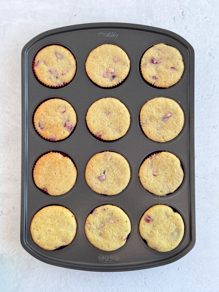 Baked cupcakes in a cupcake pan.