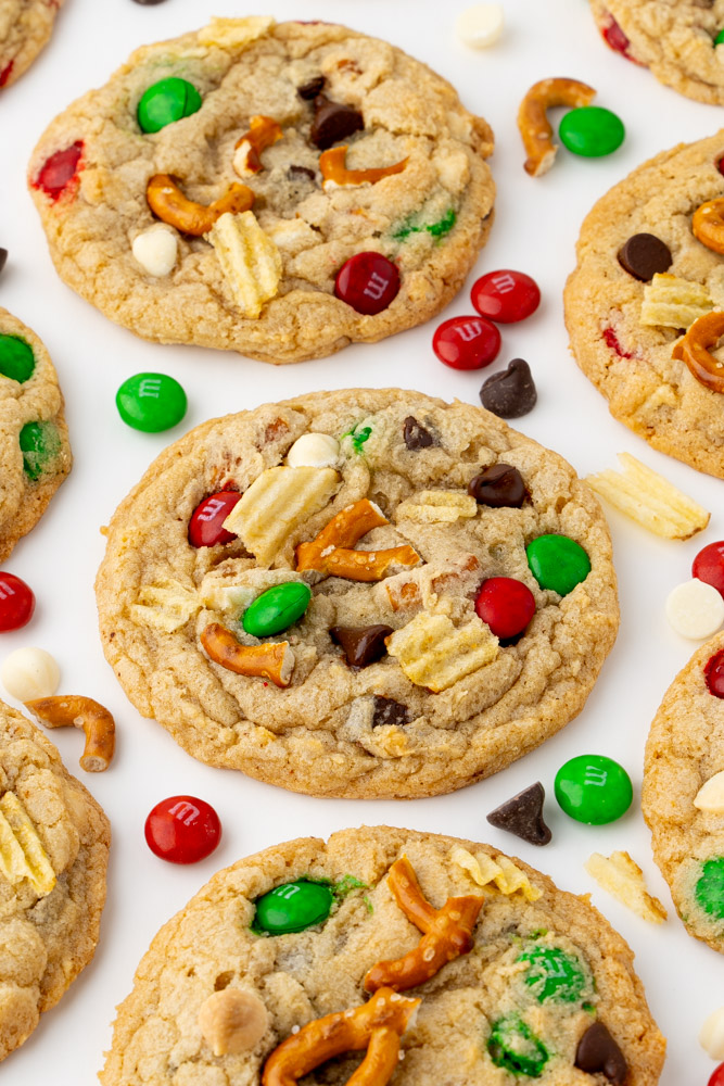 Crisp and chewy Christmas cookies with white and semisweet chocolate, M&M candies, potato chips and pretzels.