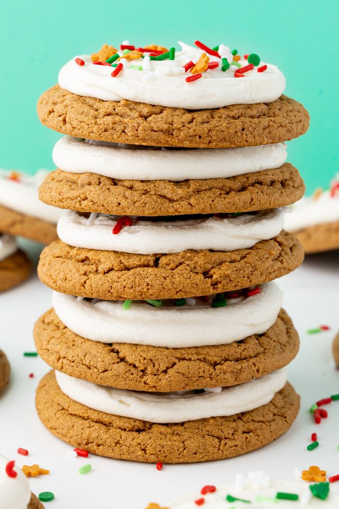 A stack of frosted gingerbread cookies.