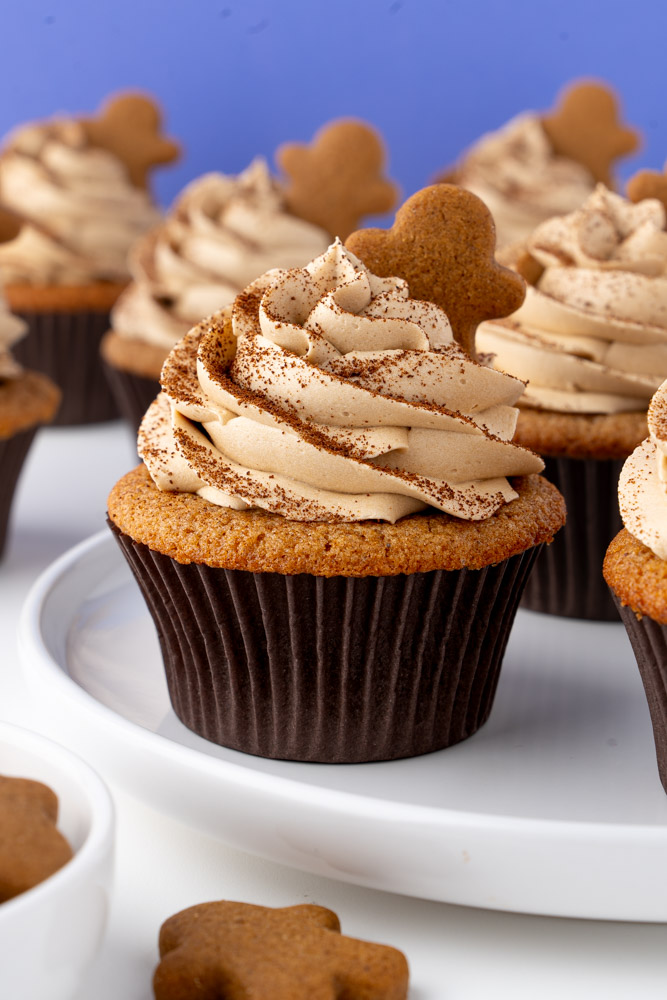 Gingerbread cupcakes with espresso frosting and a mini gingerbread man.