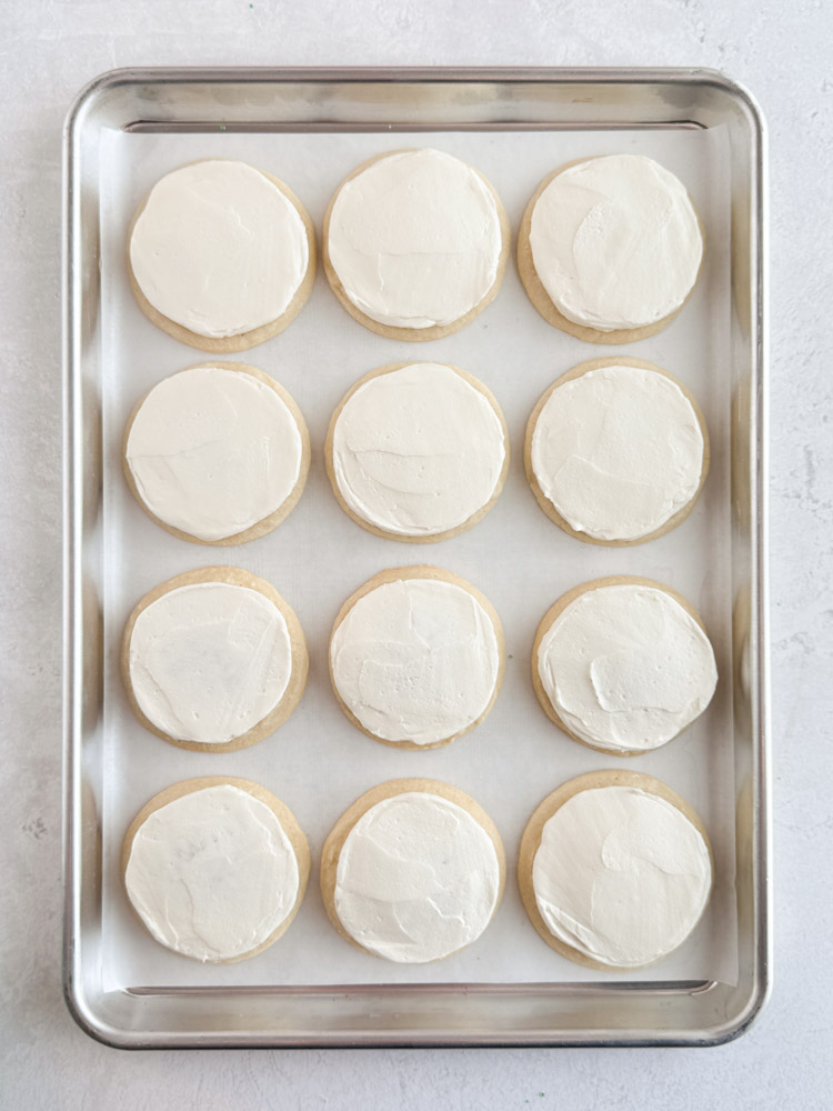 Vanilla cookies frosted with vanilla buttercream frosting.