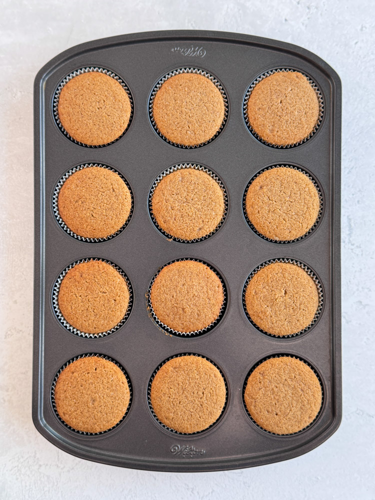Baked gingerbread cupcakes.