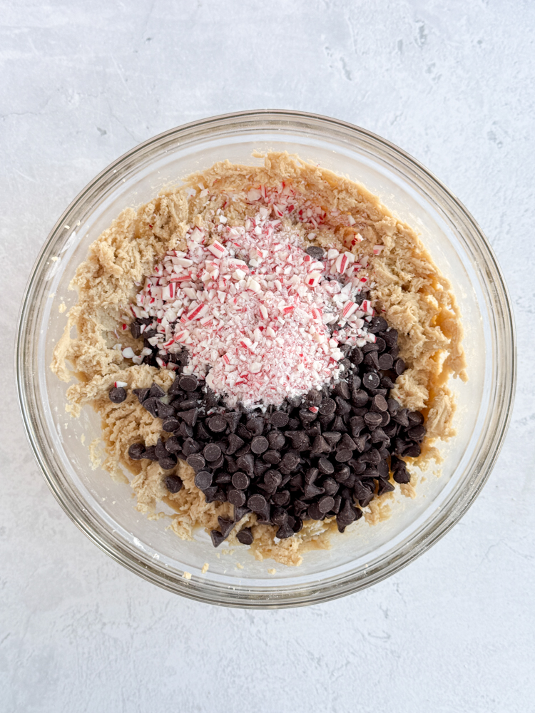 Cookie dough with semisweet chocolate and candy cane pieces.