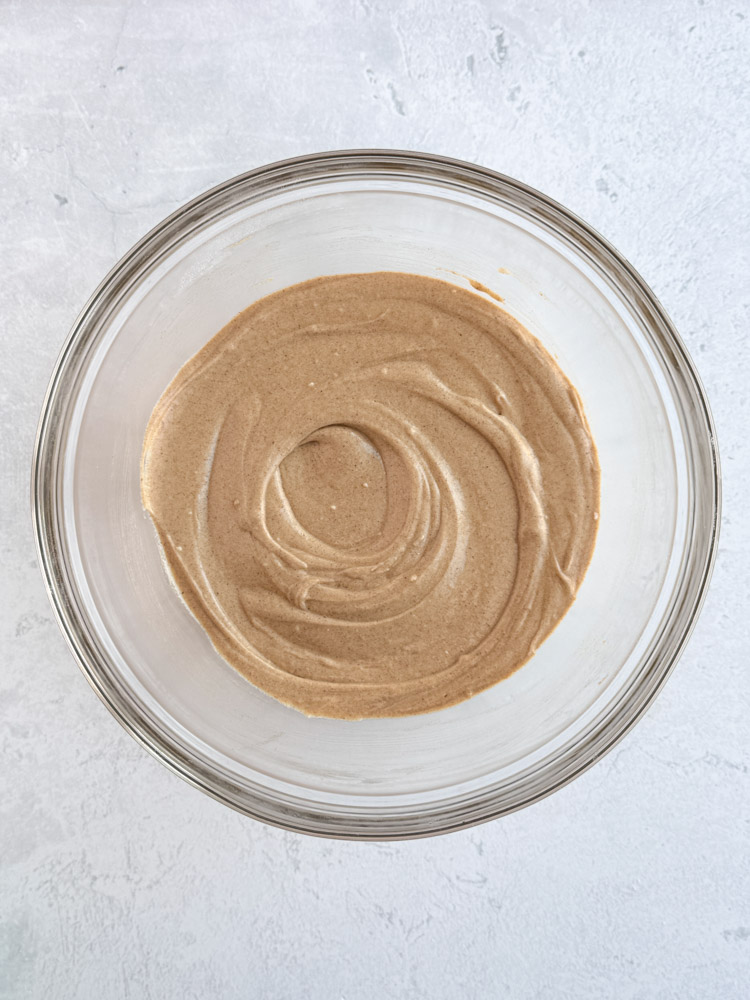Gingerbread cupcake batter in a mixing bowl.