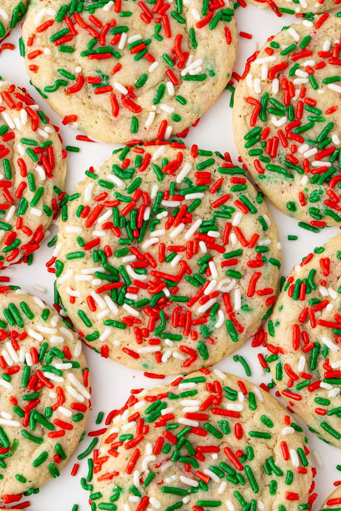 Easy vanilla sugar cookies covered in holiday sprinkles.