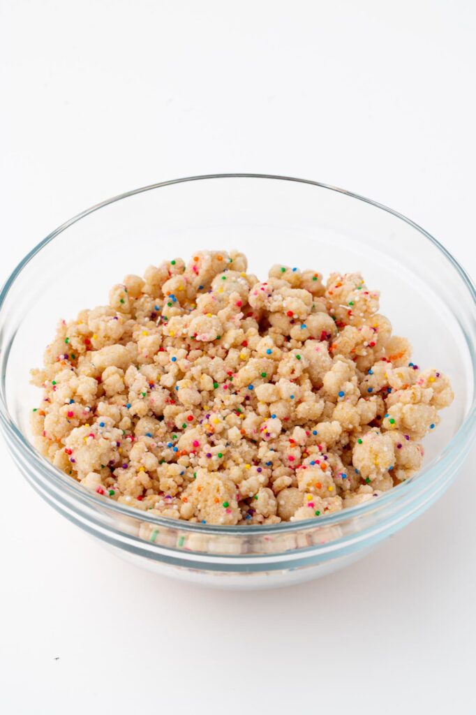 A bowl of birthday cake crumbs.
