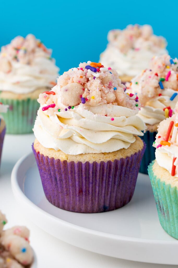 Confetti cupcakes with cake batter buttercream and birthday cake crumbs.