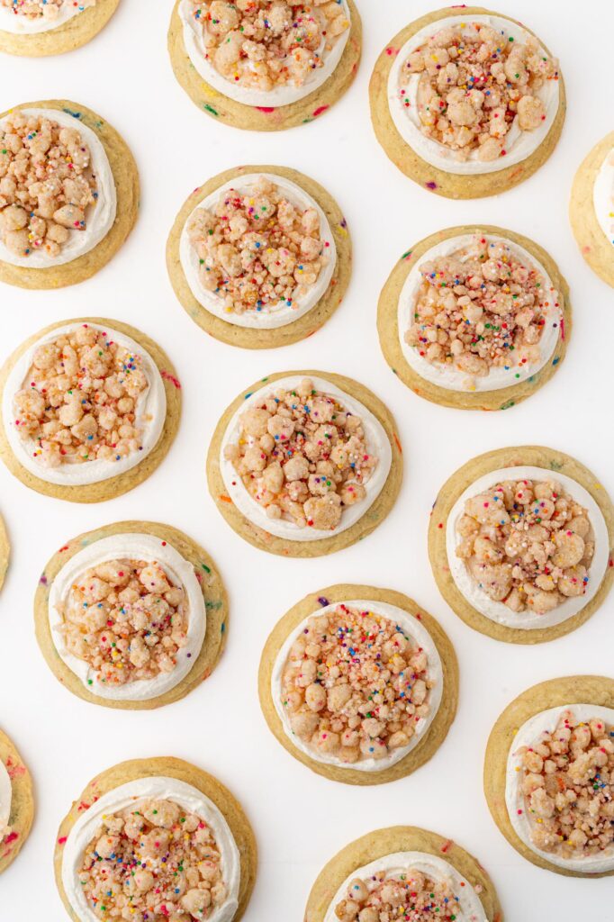Funfetti cookies with cake batter buttercream and birthday cake crumbs,