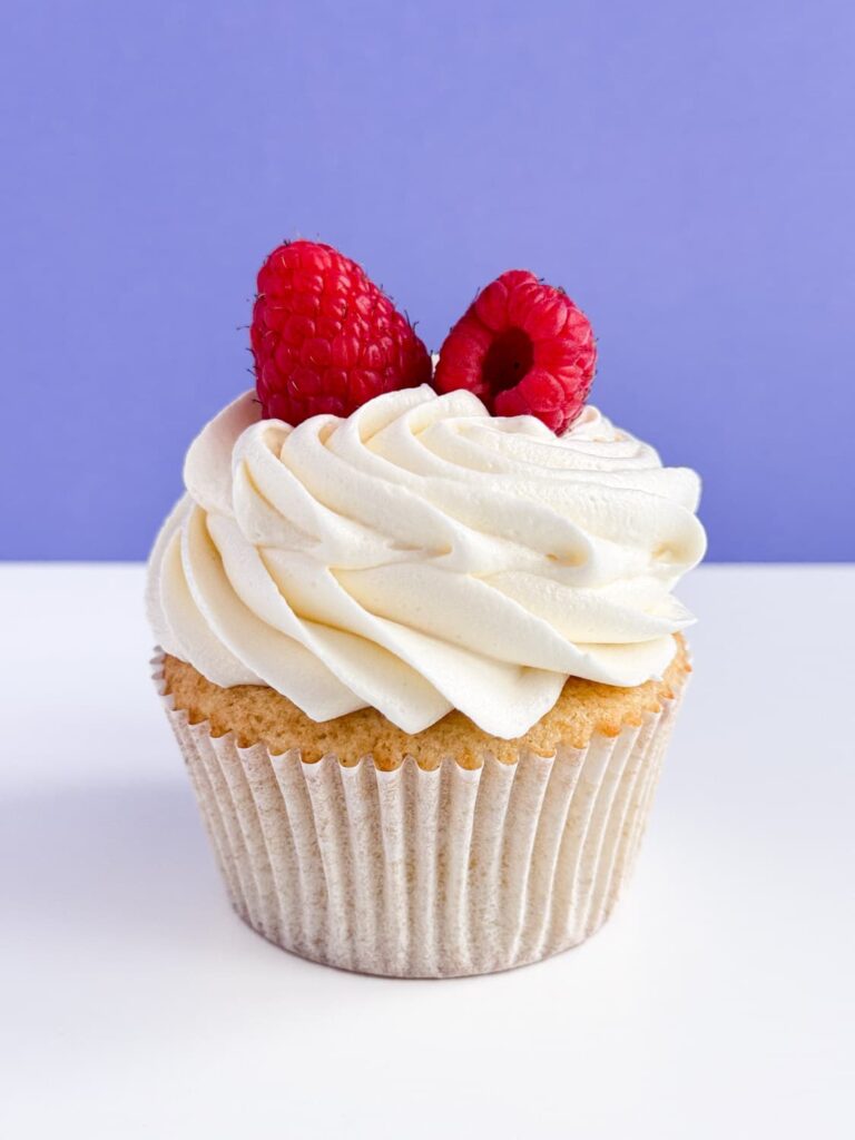 Frosted and decorated cupcake.