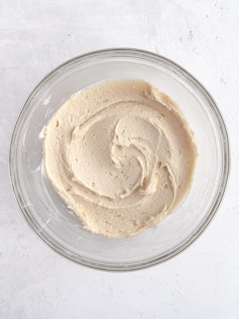 Lemon cookie dough in a mixing bowl.