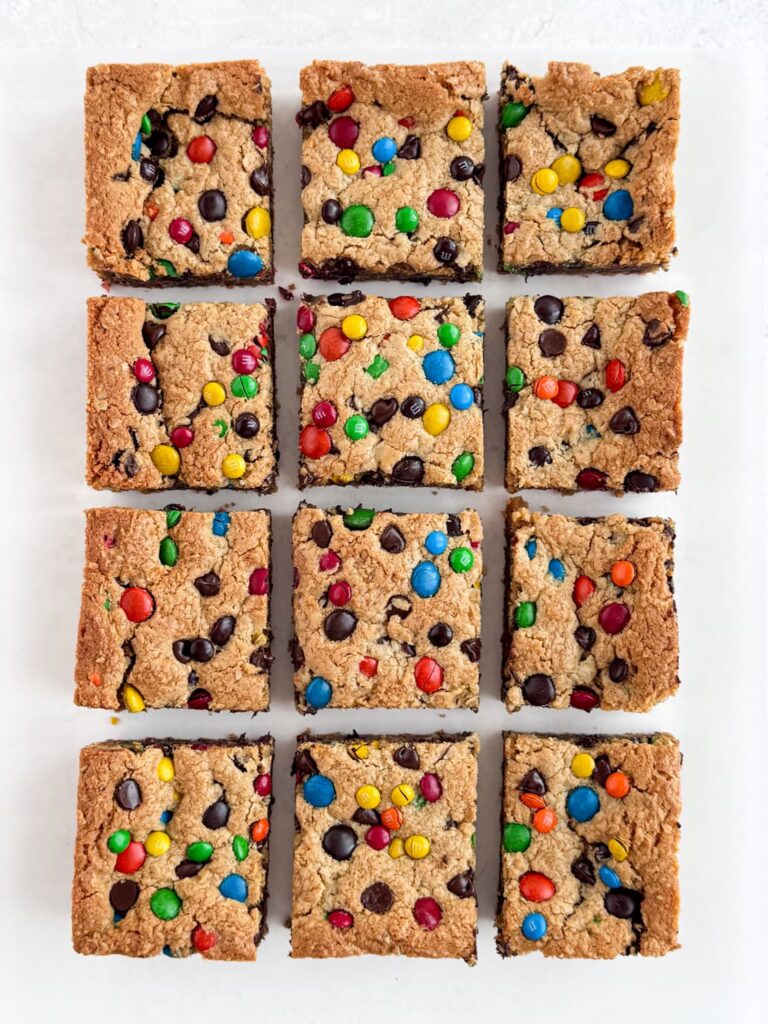 Monster cookie bars cut into squares.