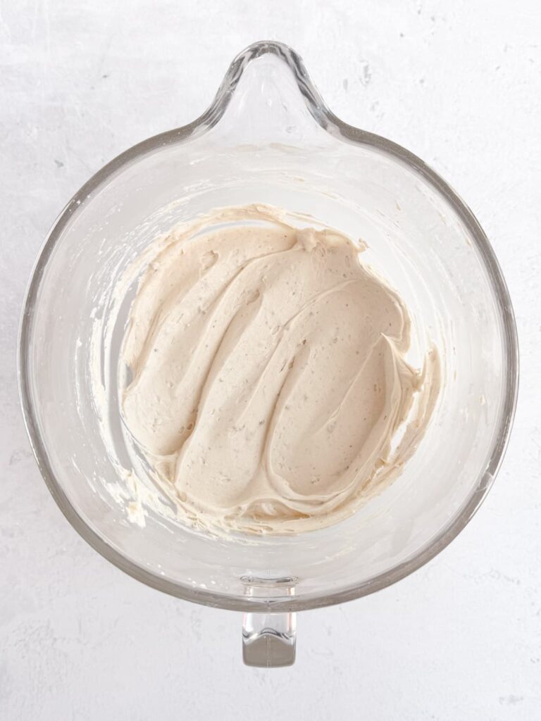 Toasted marshmallow buttercream frosting in a mixing bowl.
