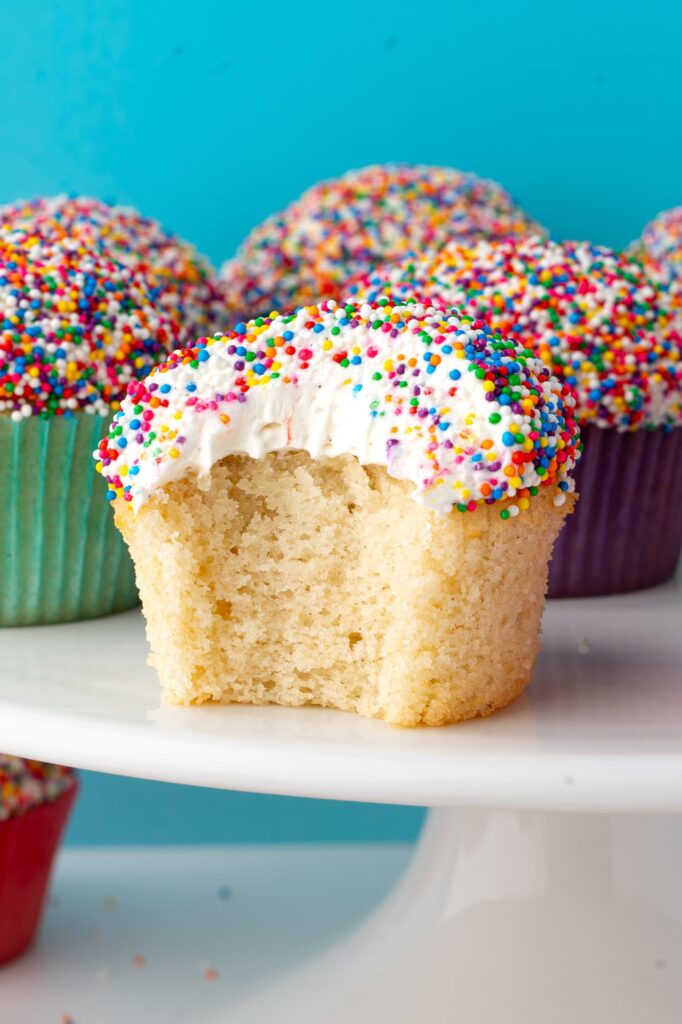A bite out of a dot cupcake to show the soft texture.