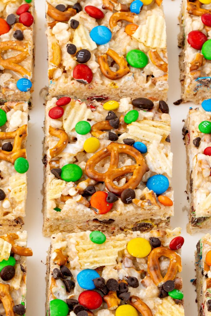 Rice Krispie treats with potato chips, pretzels and M&Ms.