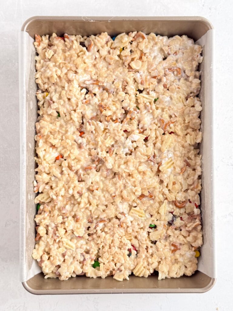 Rice Krispie treat mixture in a baking pan.