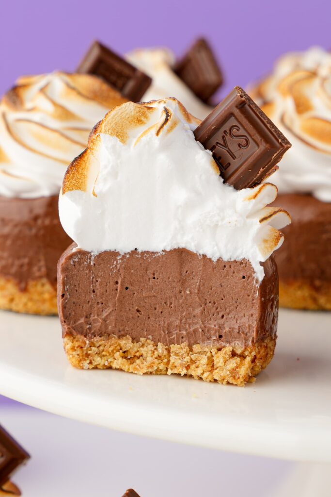 A cross section of a mini s'mores cheesecake to show the texture.