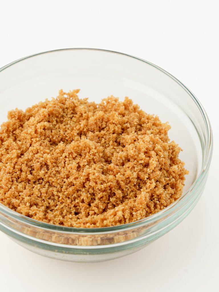 Graham cracker crumbs in a mixing bowl.