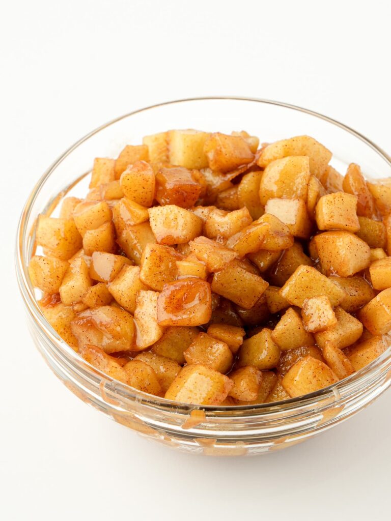 Diced cinnamon apples cooked until tender and caramelized.